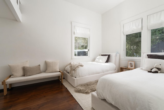 bedroom featuring dark hardwood / wood-style floors