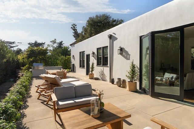 view of patio with outdoor lounge area