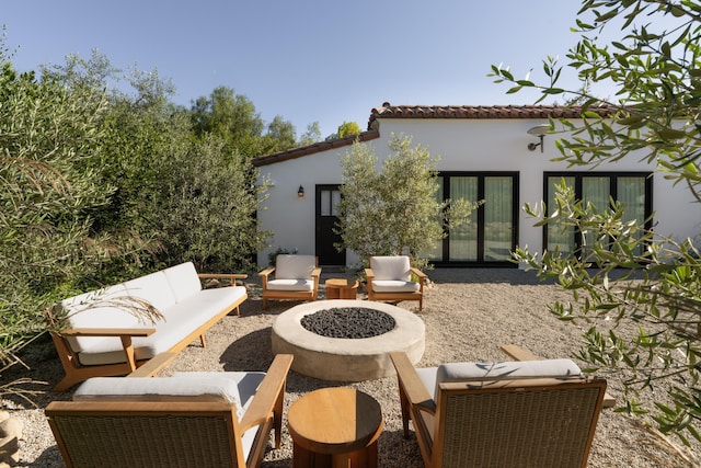 view of patio featuring a fire pit