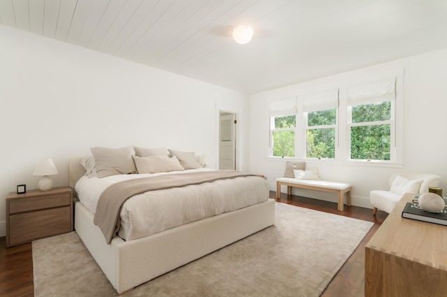 bedroom with wood-type flooring