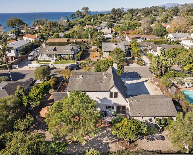 bird's eye view with a water view and a residential view