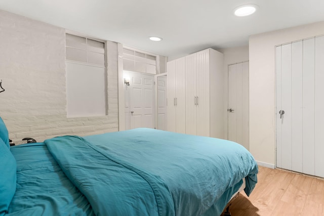 bedroom featuring light wood-type flooring