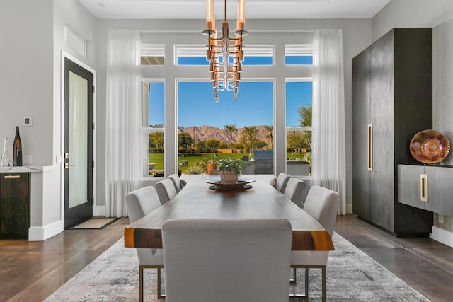 dining room featuring a mountain view