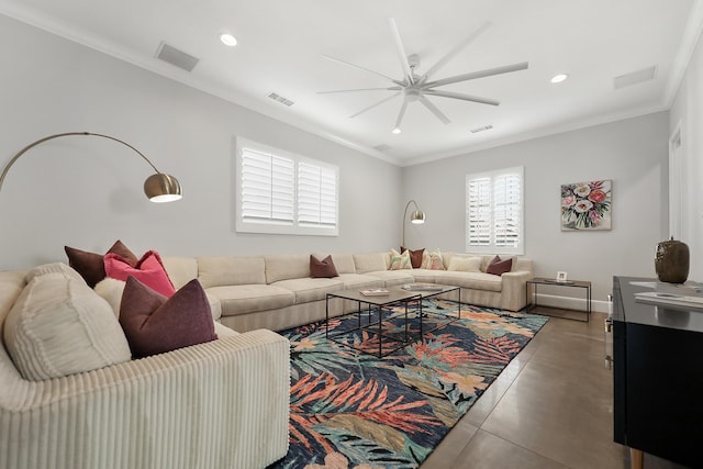 living room featuring ceiling fan and ornamental molding