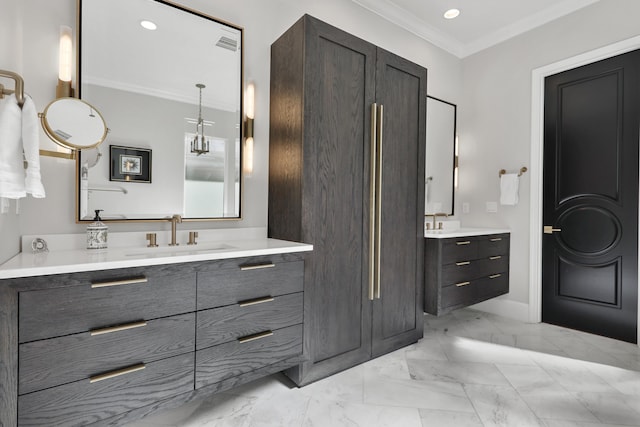 bathroom with vanity and crown molding