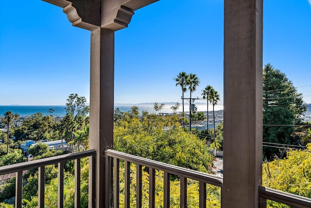 balcony featuring a water view