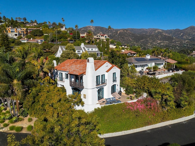 drone / aerial view featuring a mountain view