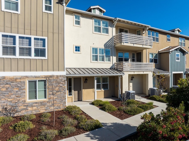 view of front of property with central AC