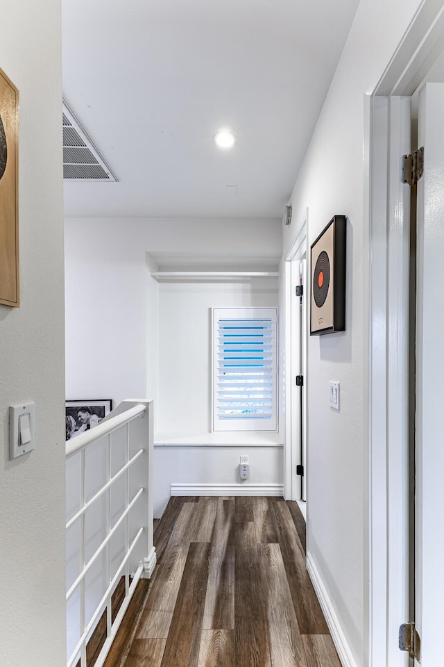 interior space with dark hardwood / wood-style flooring