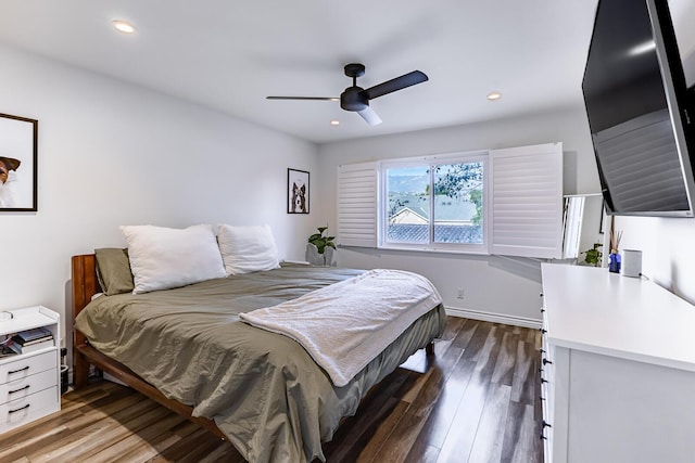 bedroom with hardwood / wood-style flooring and ceiling fan