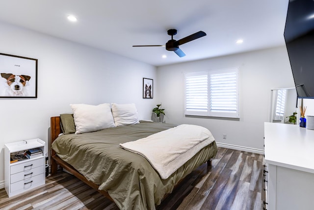 bedroom with hardwood / wood-style flooring and ceiling fan