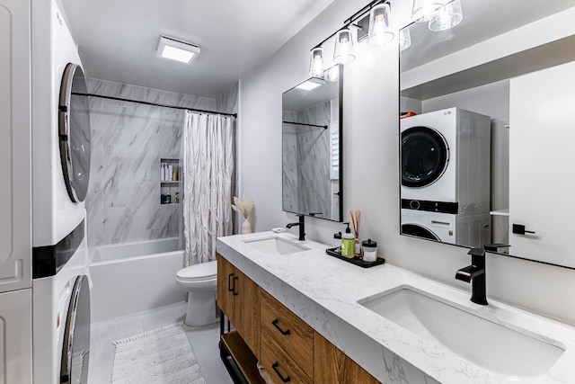 full bathroom featuring vanity, stacked washer / drying machine, tile patterned floors, toilet, and shower / bath combo with shower curtain