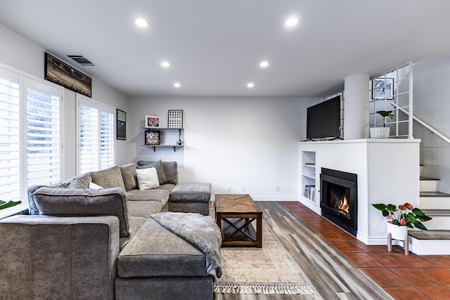 living room featuring dark hardwood / wood-style floors