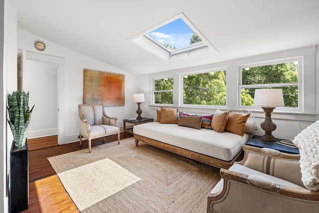 sunroom / solarium with lofted ceiling with skylight