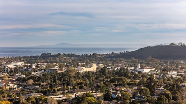 city view featuring a water and mountain view