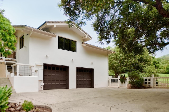 view of front of home with a garage