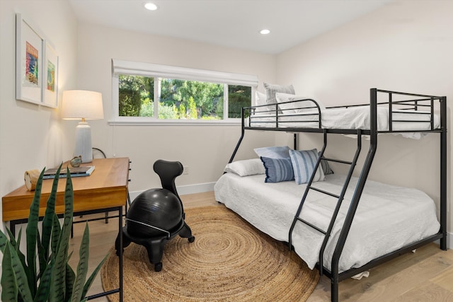 bedroom with light wood-type flooring