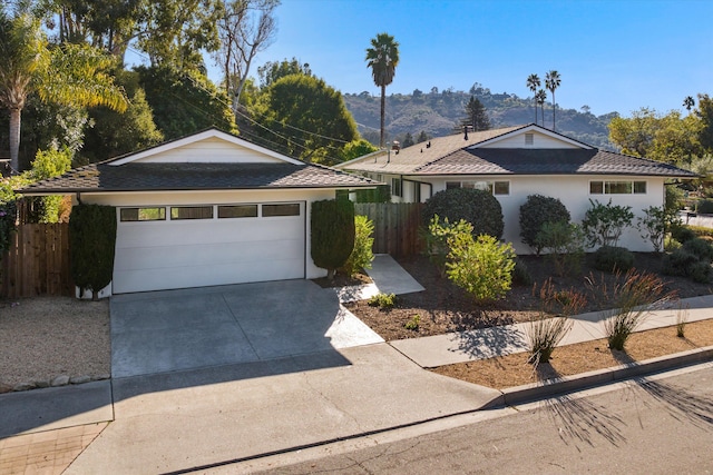 ranch-style home with a garage