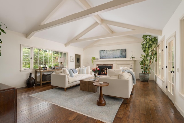 living room with dark hardwood / wood-style flooring and lofted ceiling with beams