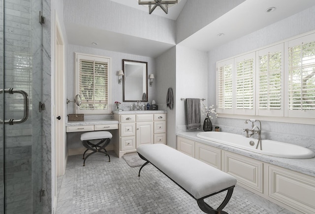 bathroom with vanity, independent shower and bath, and tile patterned flooring