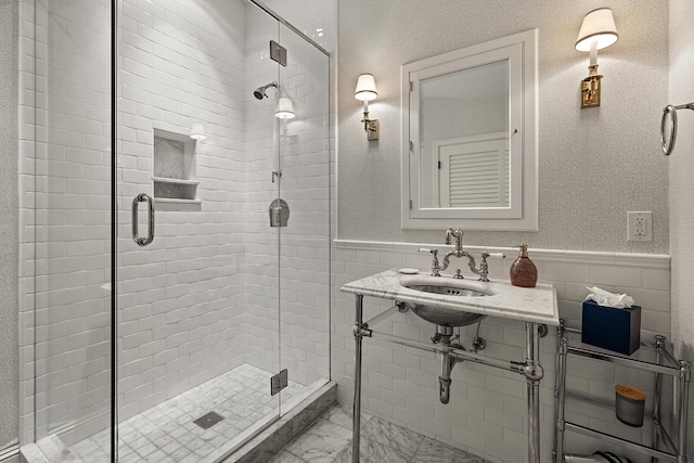 bathroom with sink and walk in shower