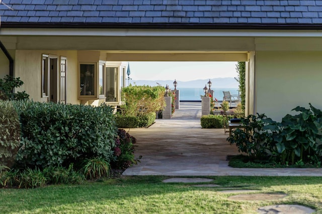 view of home's community with a patio