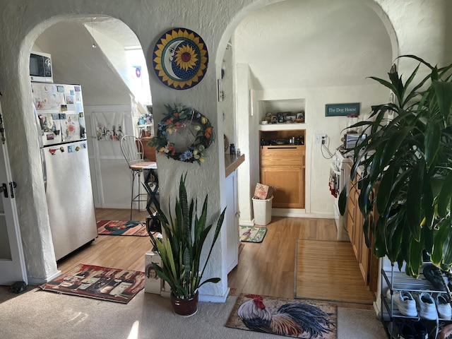 interior space with light hardwood / wood-style flooring