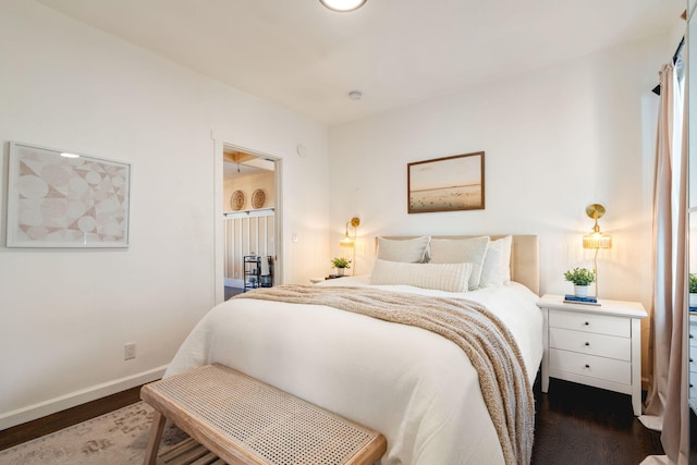 bedroom featuring dark hardwood / wood-style flooring