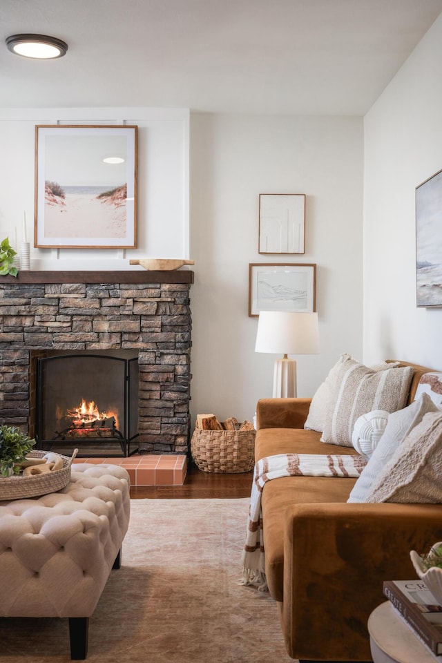 315 E Micheltorena St, Santa Barbara, CA 93101 - living area featuring a stone fireplace and wood finished floors