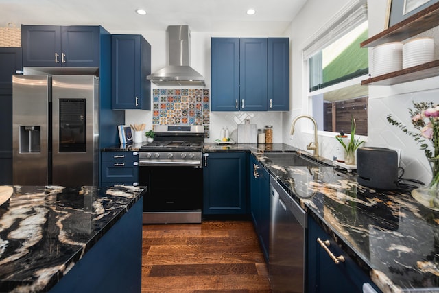 315 E Micheltorena St, Santa Barbara, CA 93101 - kitchen with wall chimney range hood, appliances with stainless steel finishes, blue cabinetry, and a sink