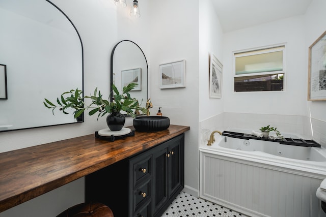 315 E Micheltorena St, Santa Barbara, CA 93101 - bathroom featuring a jetted tub and vanity