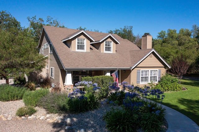 view of front of home featuring a front yard