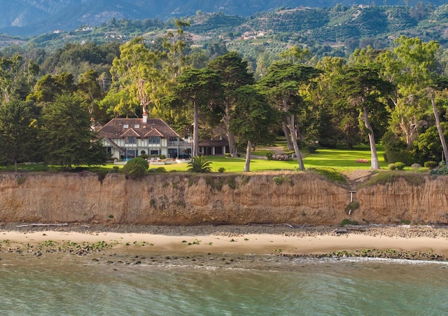 drone / aerial view with a view of the beach and a water view