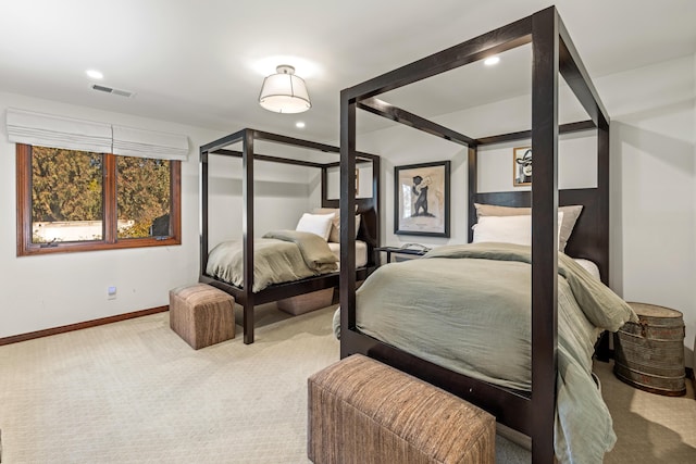 bedroom with baseboards, recessed lighting, visible vents, and light colored carpet