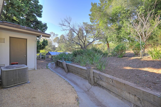 view of yard featuring cooling unit