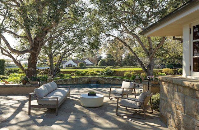 view of patio / terrace with an outdoor hangout area