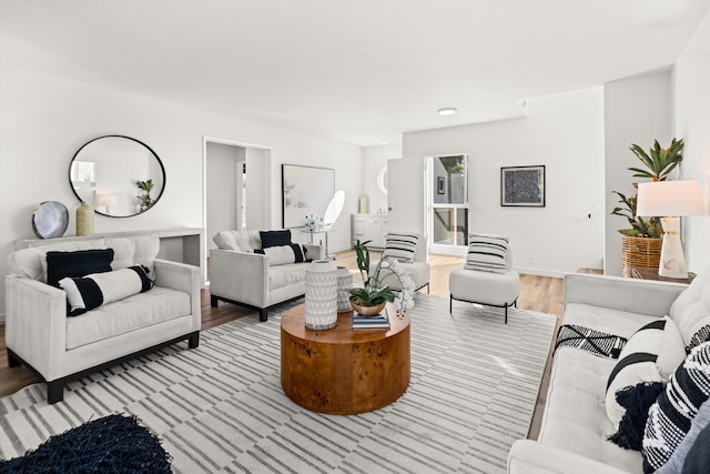 living room with light hardwood / wood-style floors