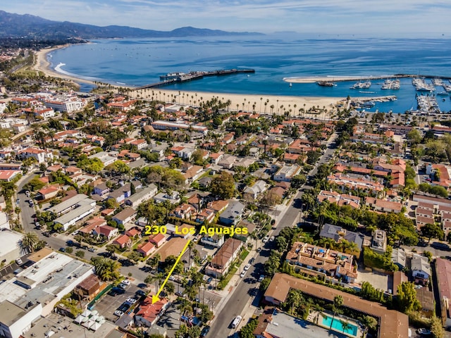 bird's eye view with a water and mountain view and a beach view