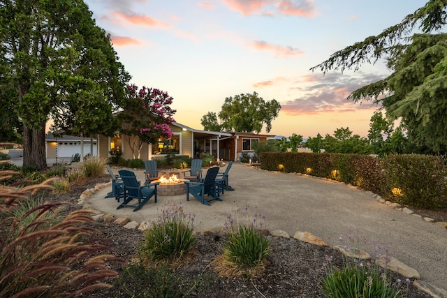 exterior space featuring a fire pit