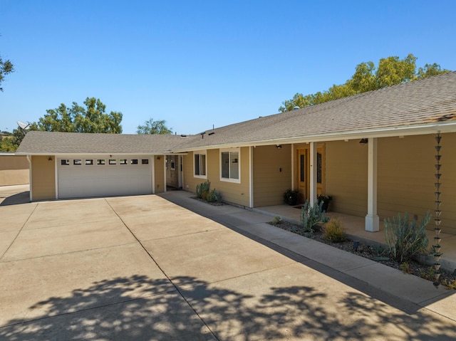 ranch-style home with a garage