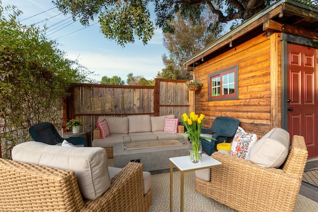 wooden deck featuring an outdoor hangout area