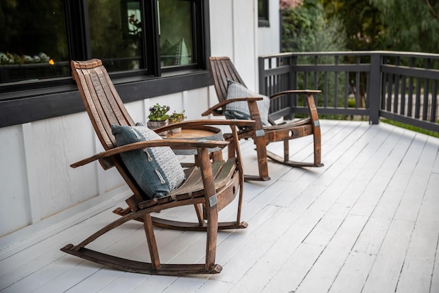 wooden deck featuring covered porch