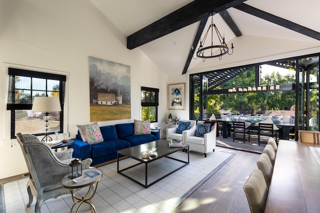 living room with beam ceiling, high vaulted ceiling, hardwood / wood-style floors, and an inviting chandelier