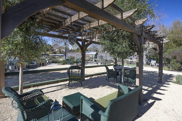 view of property's community with a pergola