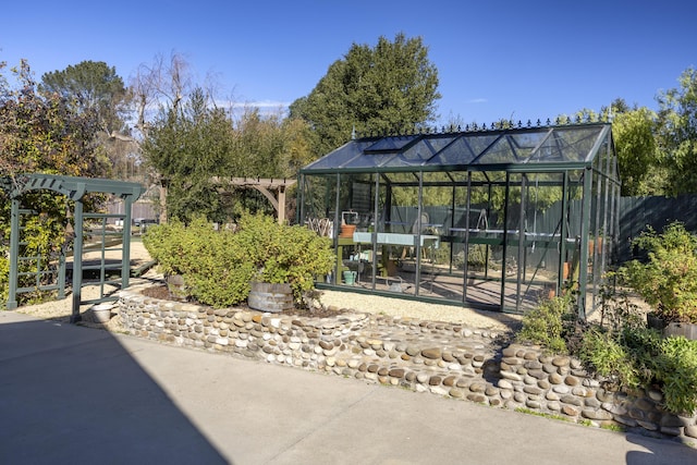 view of patio with an outdoor structure