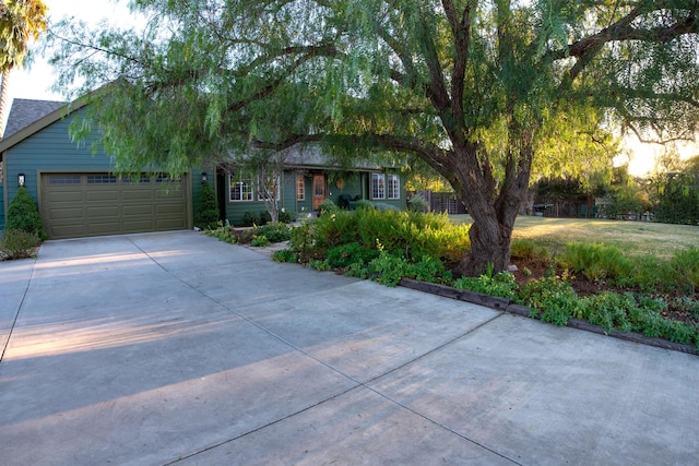 obstructed view of property featuring a garage