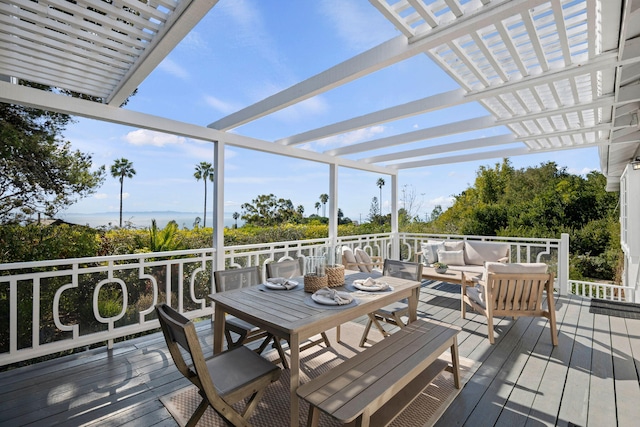 wooden deck featuring an outdoor hangout area, a water view, and a pergola