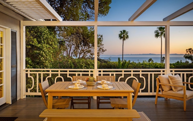 sunroom with a water view