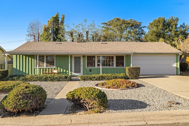 single story home with a garage