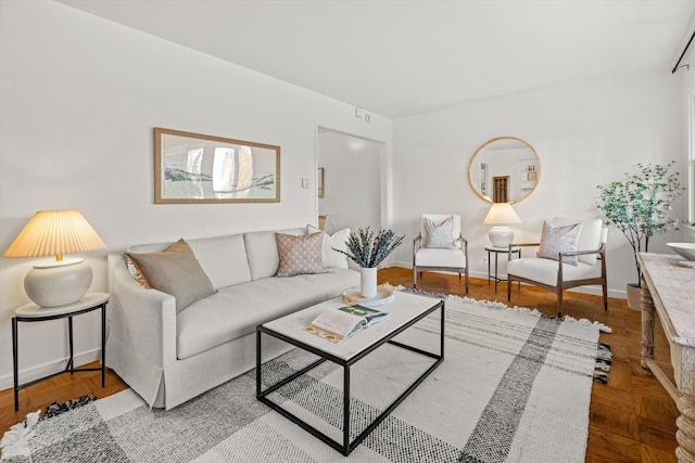 living room featuring parquet flooring